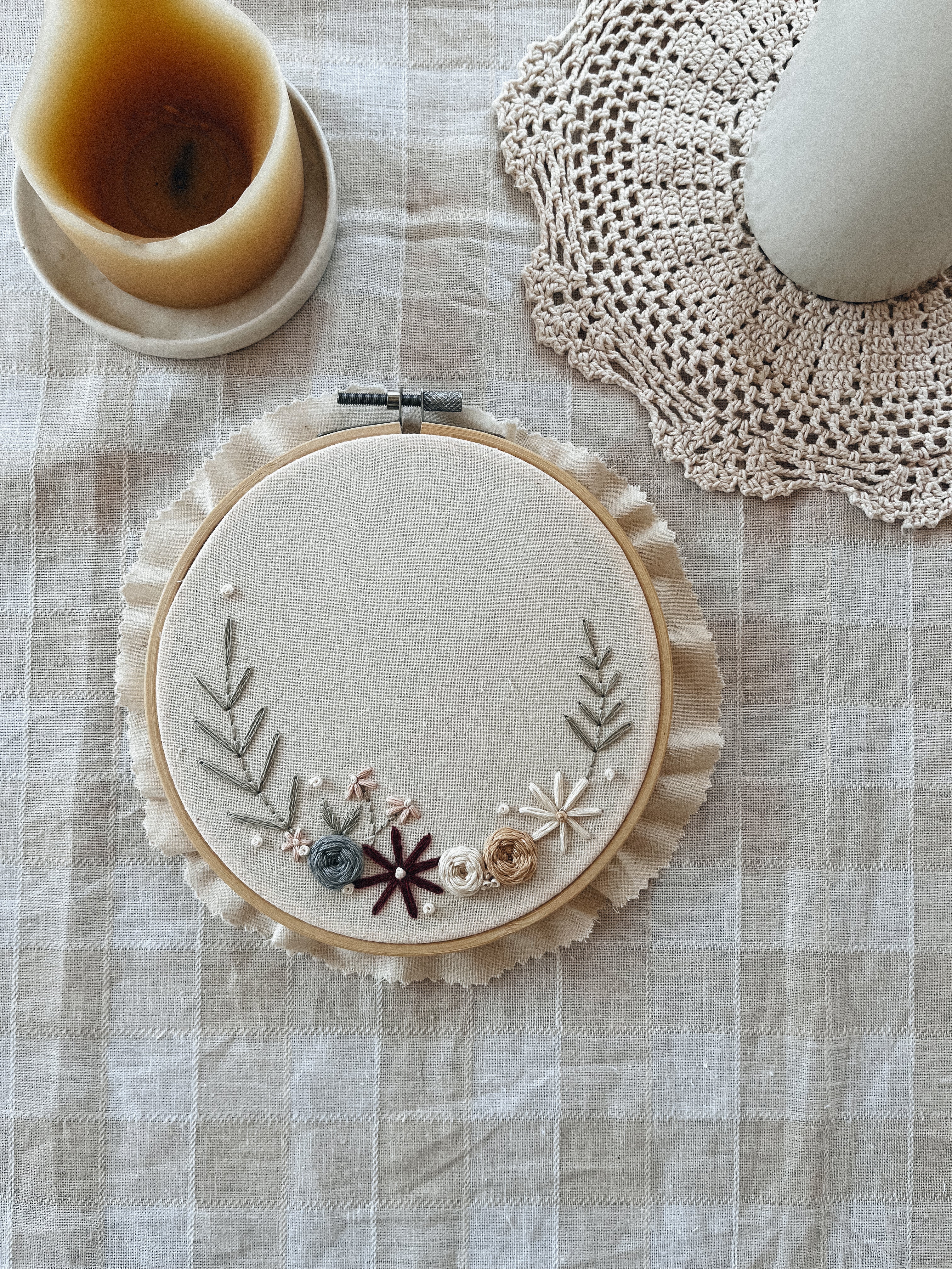 Embroidery with name and small floral wreath
